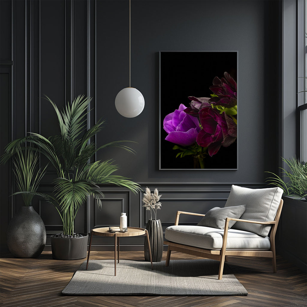 Modern living room with a dark wall, a chair, a small table, and decorative plants.