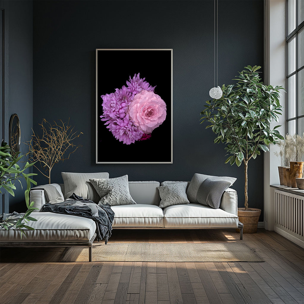 Modern living room with a gray sofa, decorative plant, and a large floral artwork on the wall.